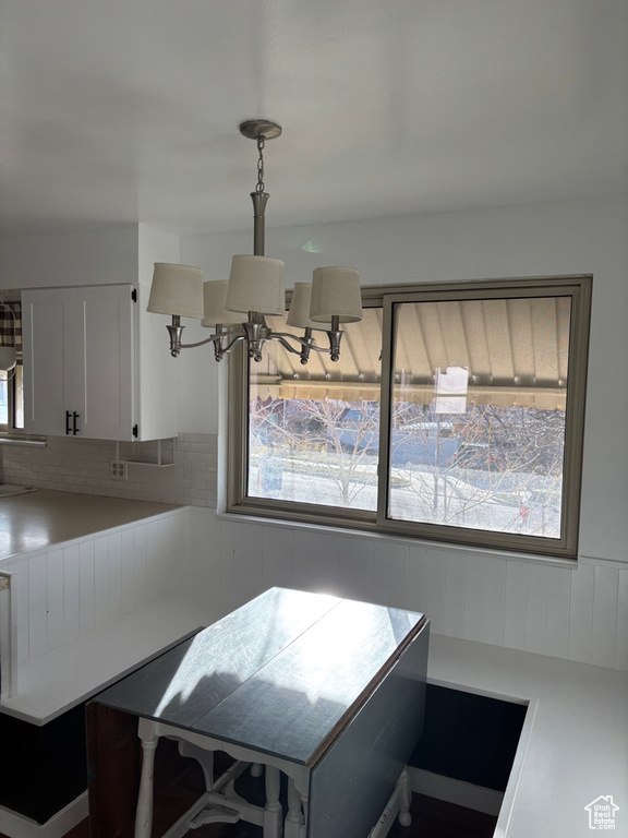 Dining room featuring a notable chandelier