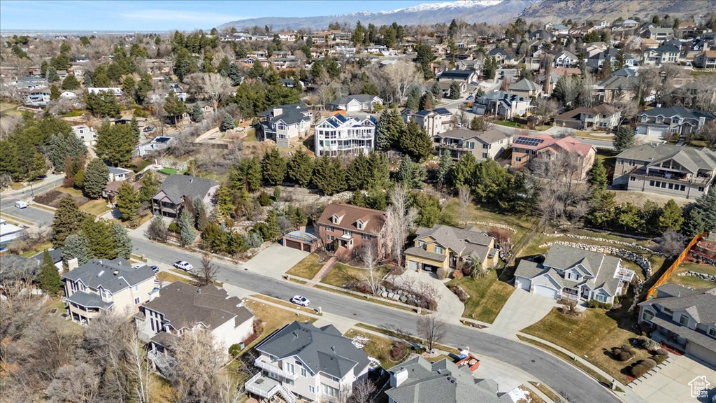 Birds eye view of property featuring a mountain view and a residential view