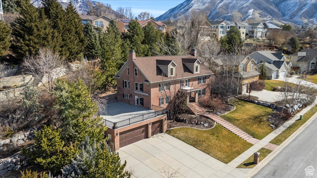 Drone / aerial view featuring a mountain view and a residential view