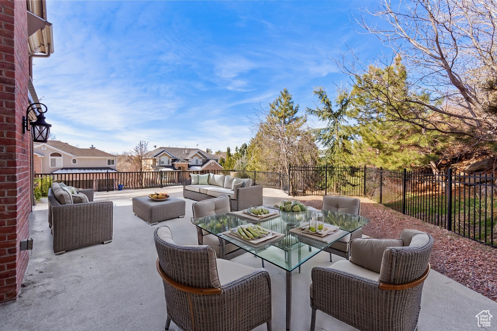 View of patio / terrace with outdoor lounge area and fence