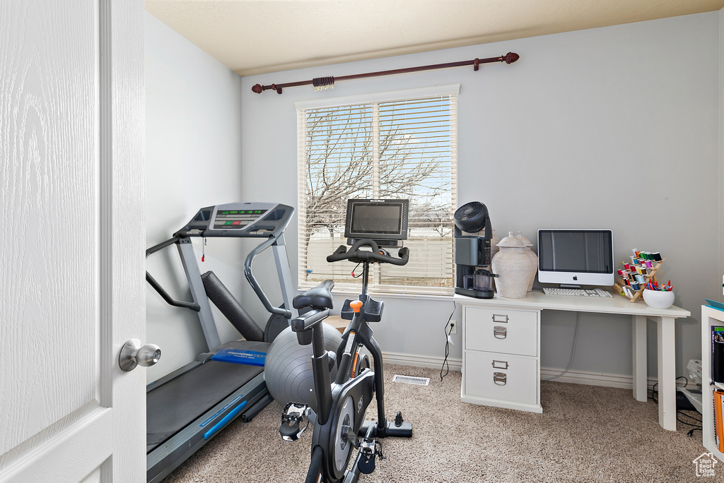 Workout area with baseboards