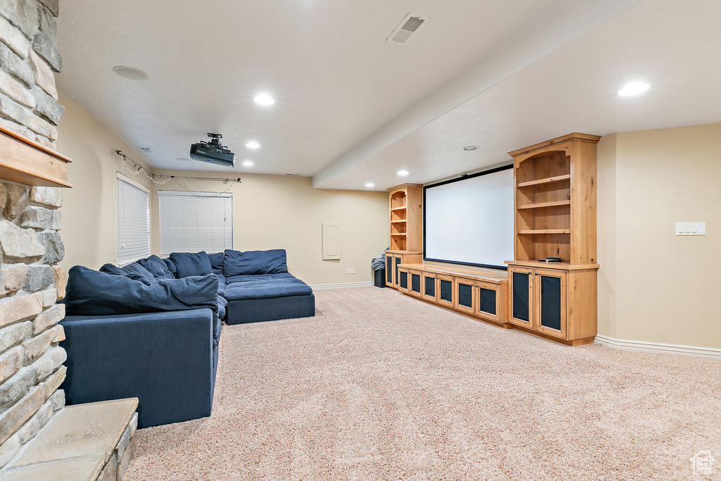 Home theater room featuring visible vents, recessed lighting, baseboards, and carpet floors