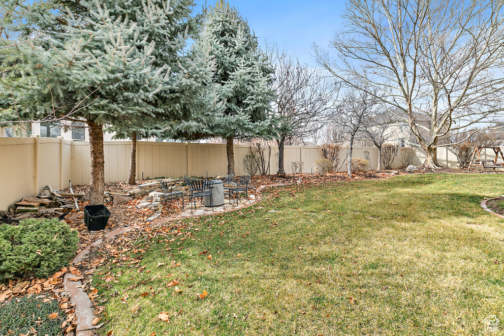 View of yard featuring a fenced backyard