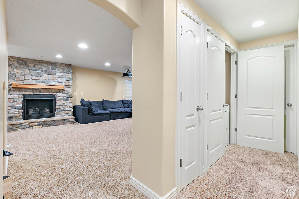 Hall with recessed lighting, baseboards, and carpet floors