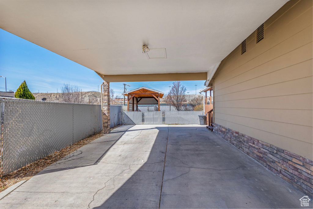 View of patio / terrace with a gazebo and fence