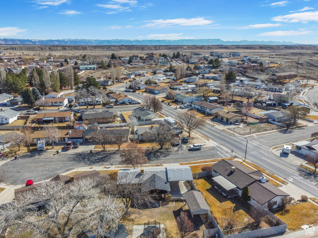 Birds eye view of property featuring a residential view and a mountain view