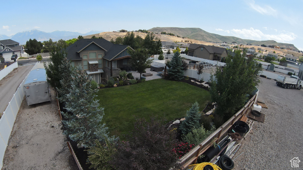 Aerial view of residential area with mountains