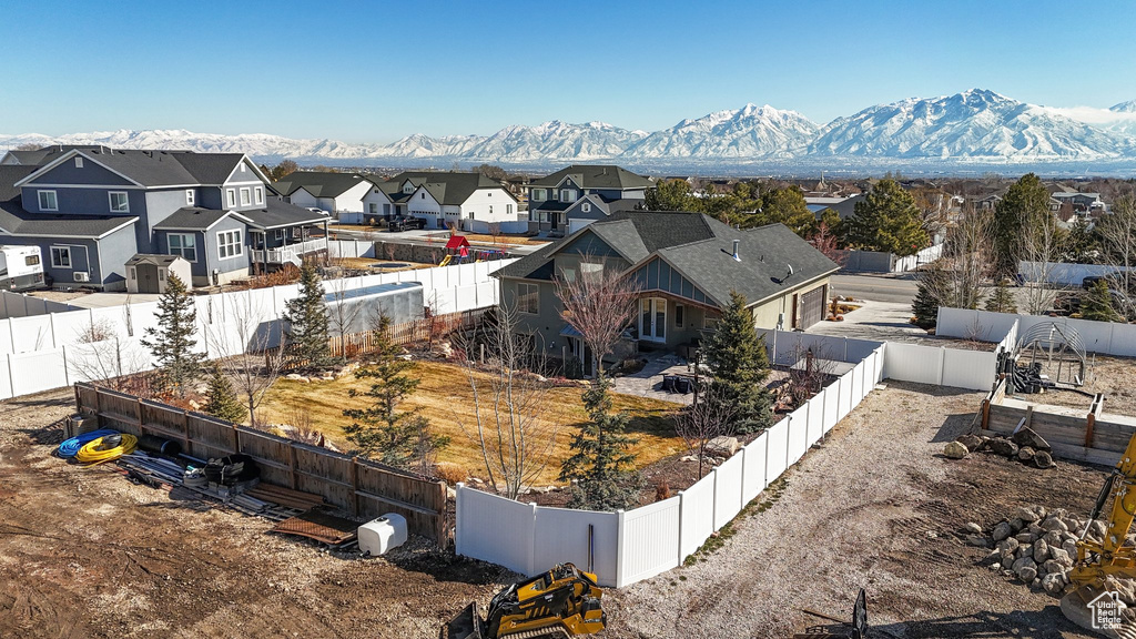 Drone / aerial view with a mountain view and a residential view