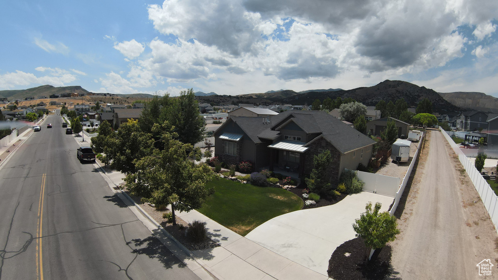 View of mountain background featuring nearby suburban area