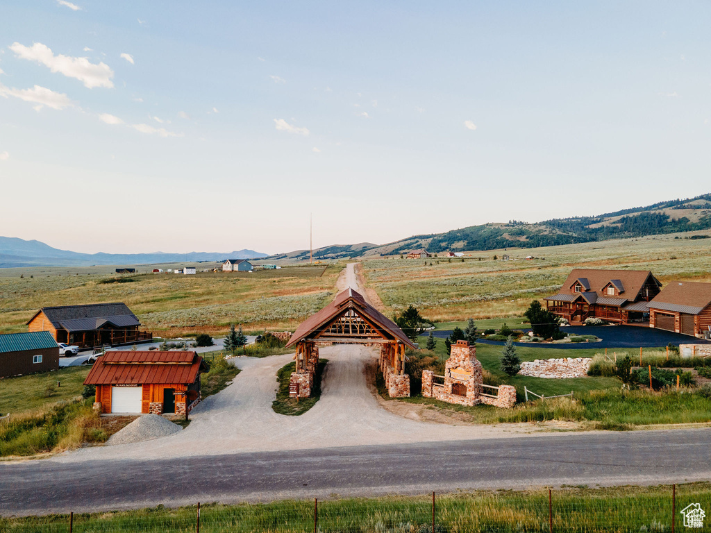 Property view of mountains with a rural view