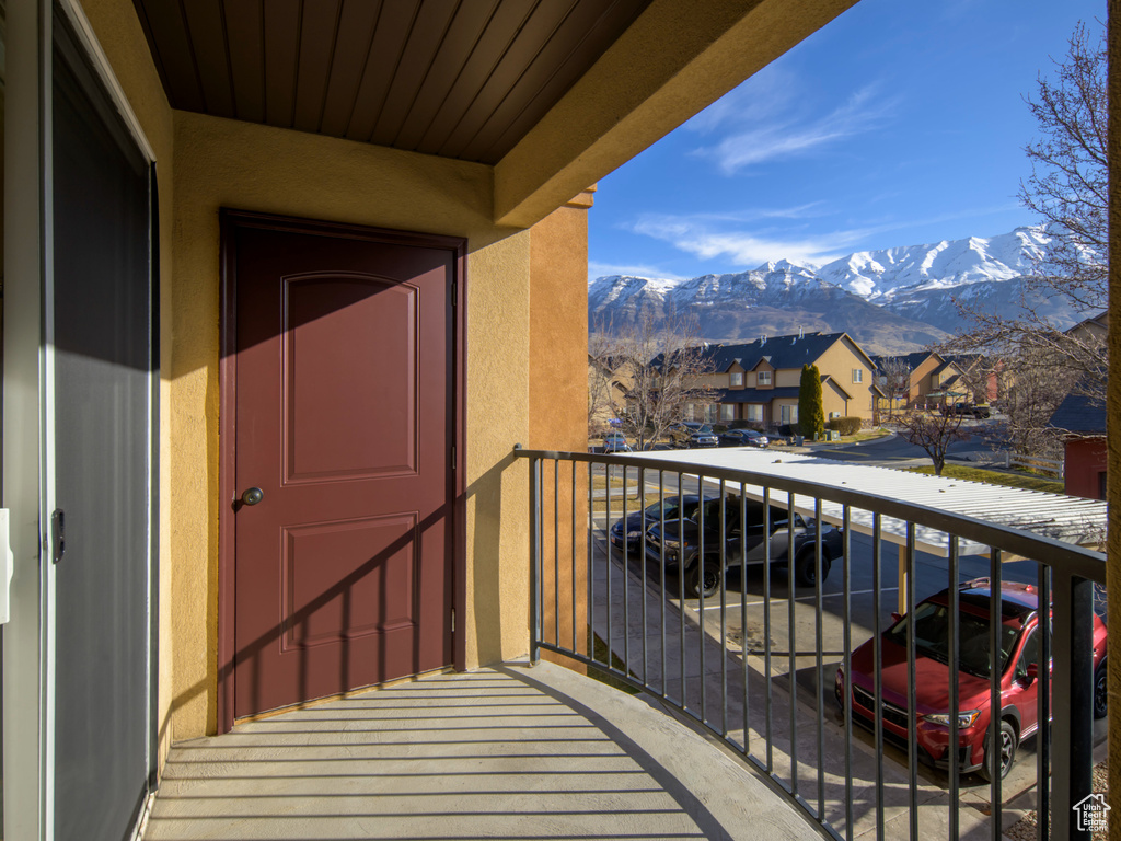 Balcony with a mountain view and a residential view