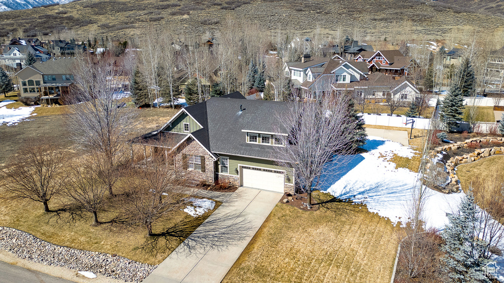 Birds eye view of property with a residential view