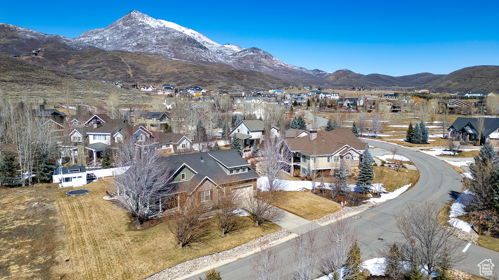 Property view of mountains featuring a residential view