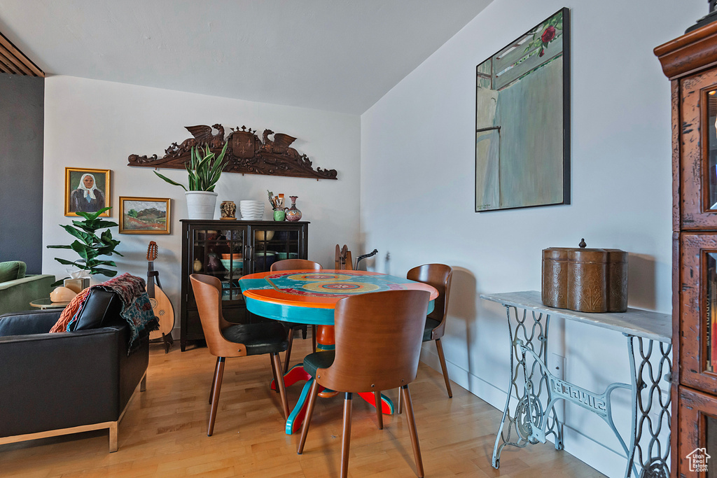 Dining space with wood finished floors