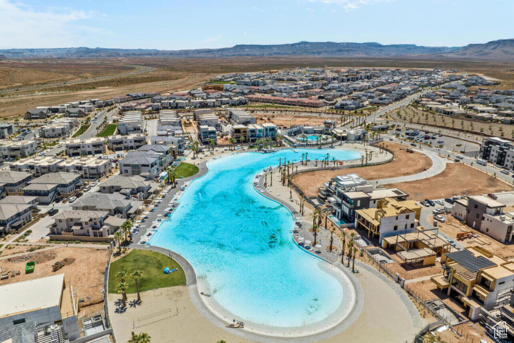 Birds eye view of property with a mountain view