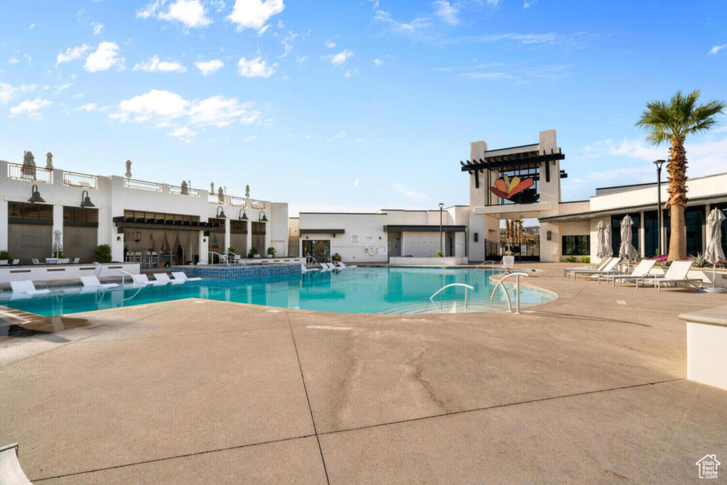 Community pool featuring a patio area