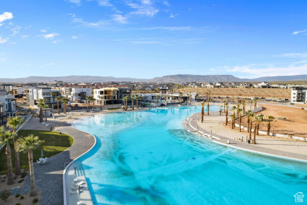 Community pool with a mountain view