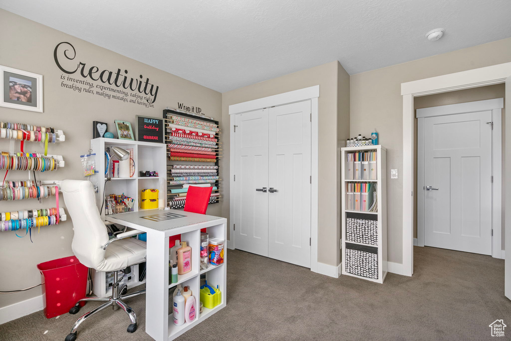 Game room with baseboards and carpet floors