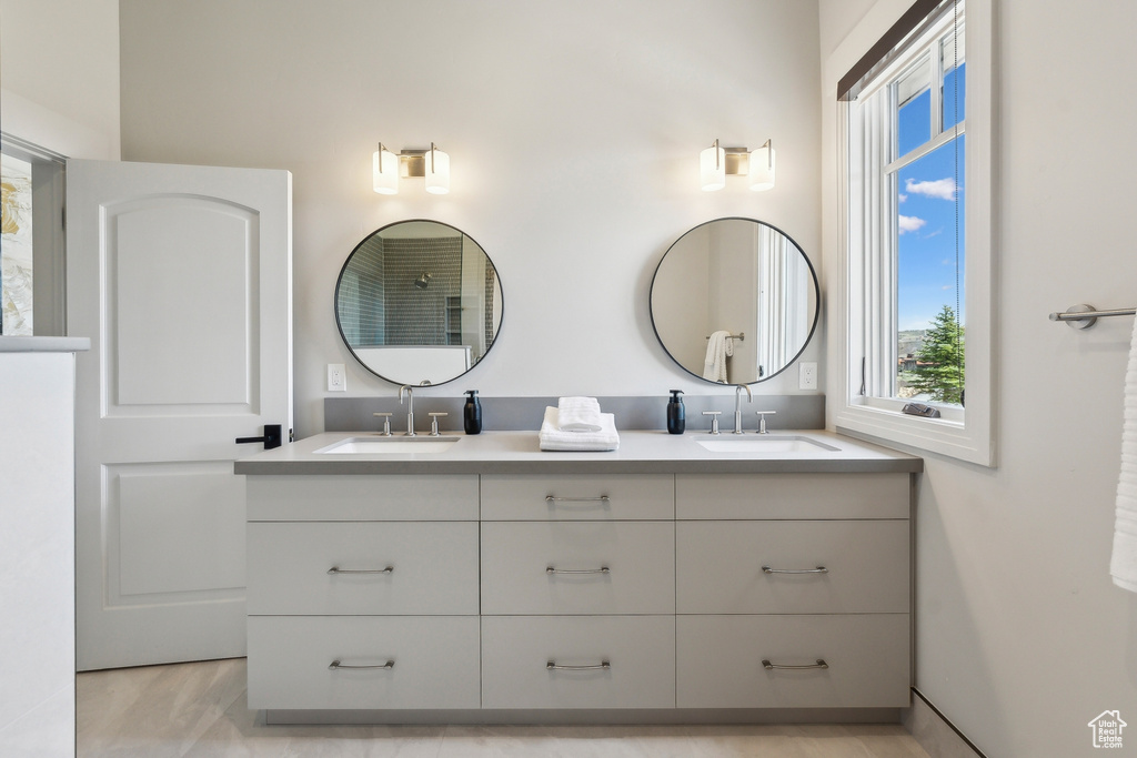 Bathroom with double vanity and a sink