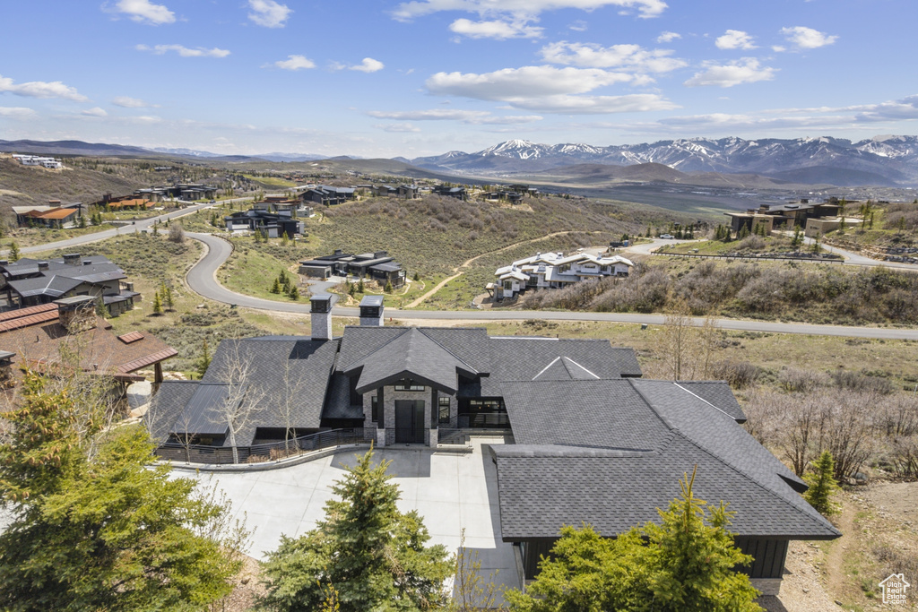Birds eye view of property featuring a mountain view