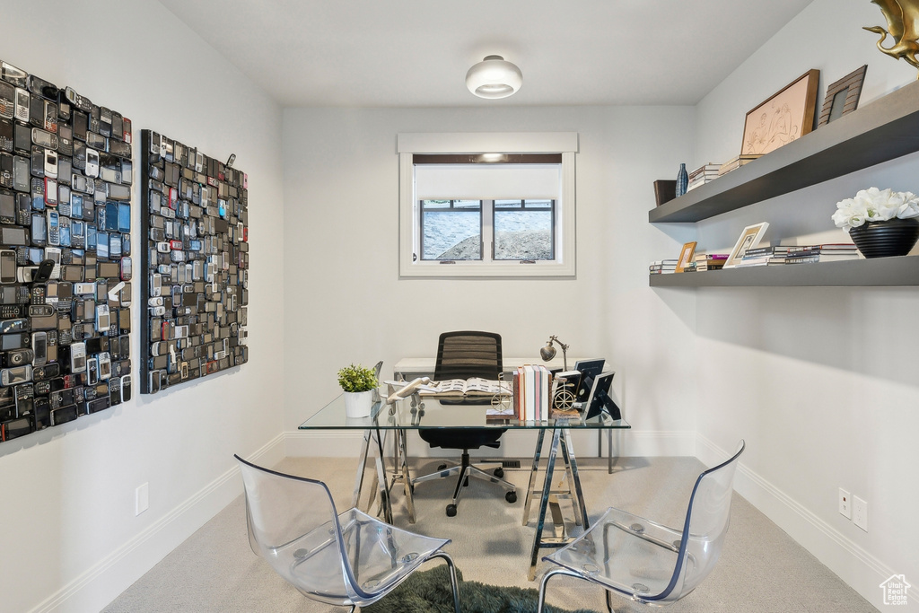 Home office featuring baseboards