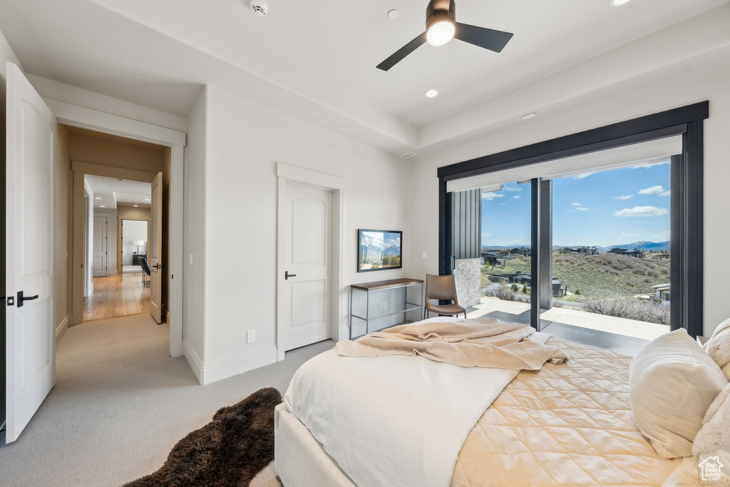 Bedroom featuring access to exterior, baseboards, ceiling fan, light colored carpet, and recessed lighting
