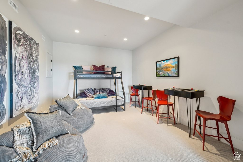 Carpeted bedroom featuring recessed lighting and visible vents
