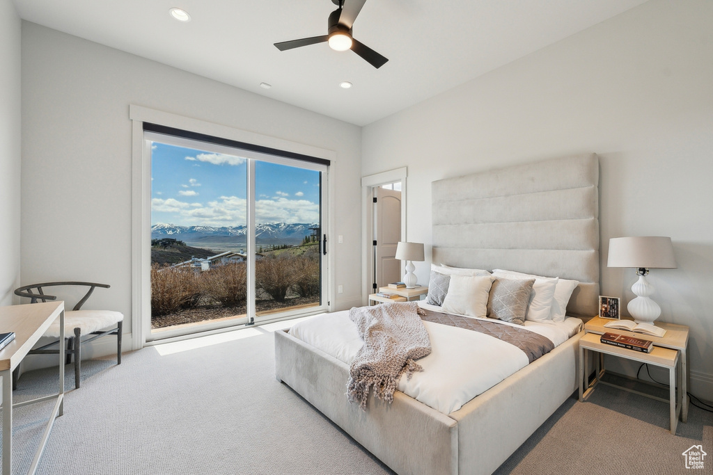 Carpeted bedroom featuring recessed lighting, ceiling fan, and access to exterior