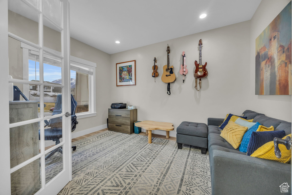 Living room featuring recessed lighting and baseboards