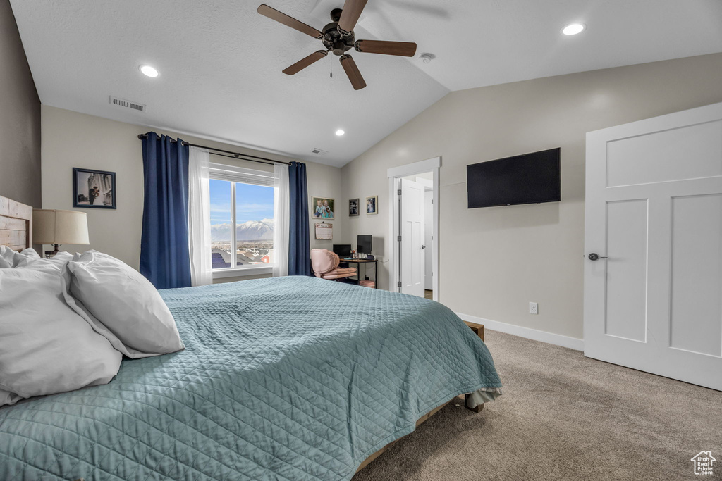 Carpeted bedroom featuring visible vents, recessed lighting, baseboards, and lofted ceiling