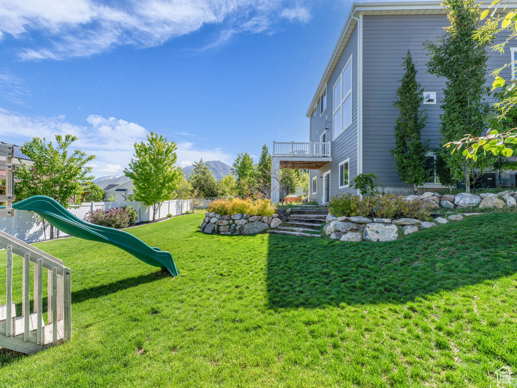 View of yard with a playground