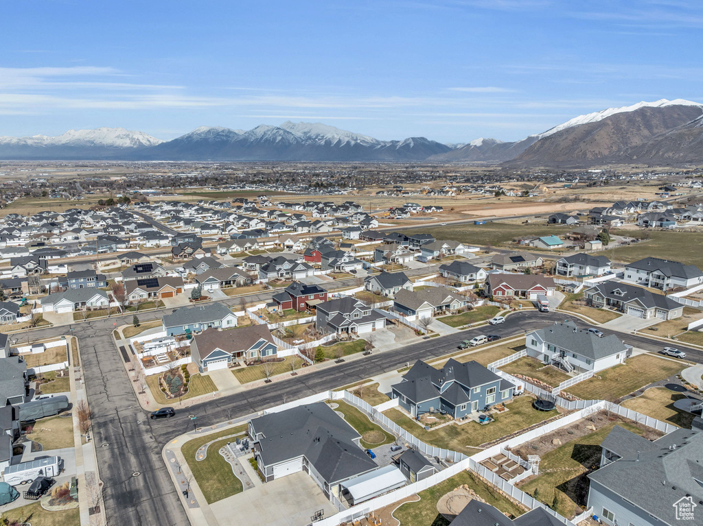 Aerial view featuring a mountain view and a residential view