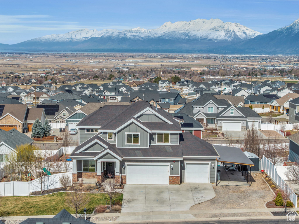 Aerial view featuring a mountain view and a residential view