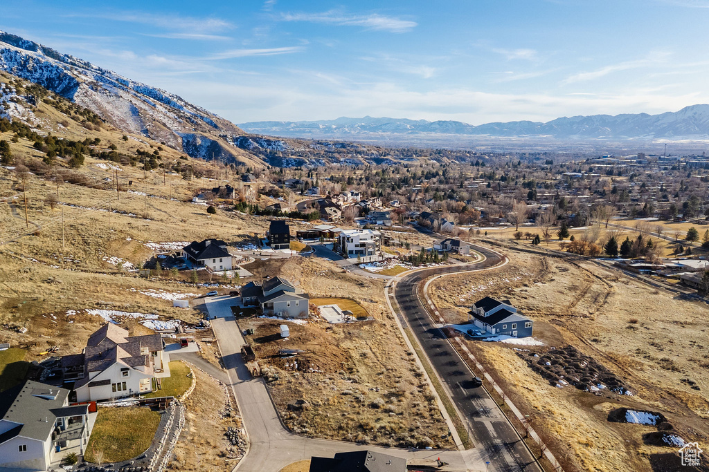 Drone / aerial view featuring a mountain view and a residential view