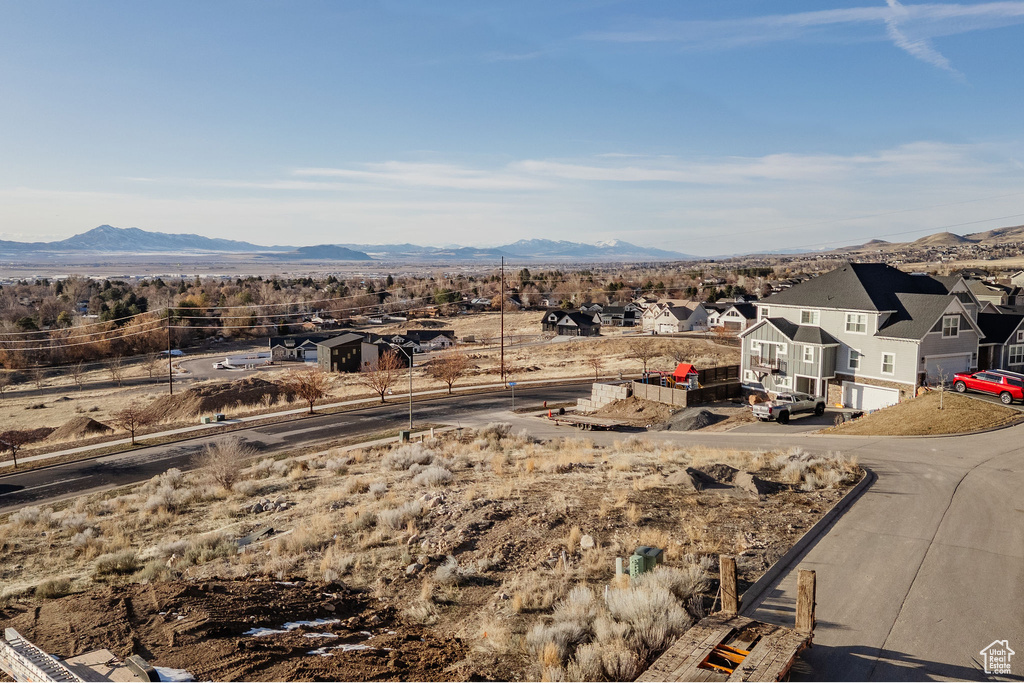 Property view of mountains featuring a residential view