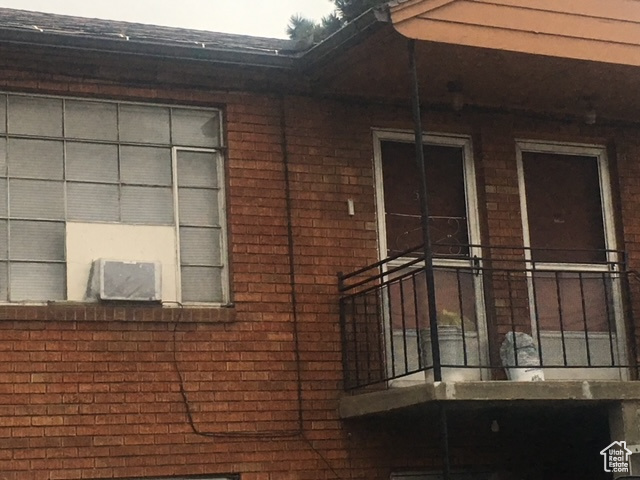 Exterior space with brick siding