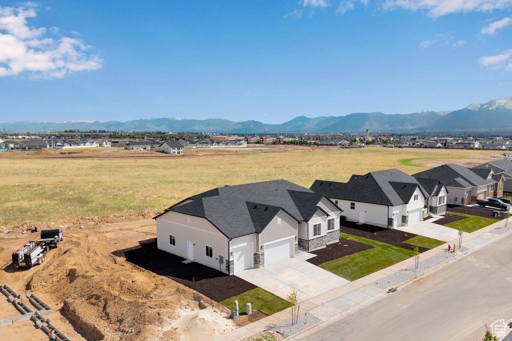 Aerial perspective of suburban area with mountains