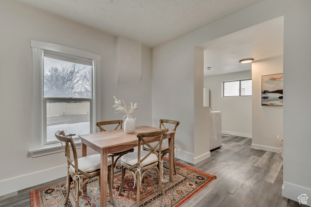 Dining room featuring baseboards and wood finished floors