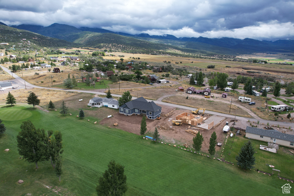 Birds eye view of property featuring a mountain view and a rural view