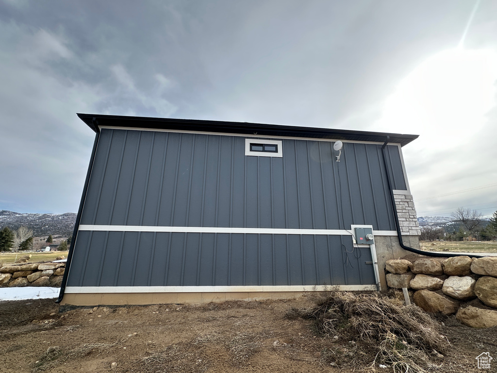 View of outdoor structure featuring a mountain view and an outdoor structure