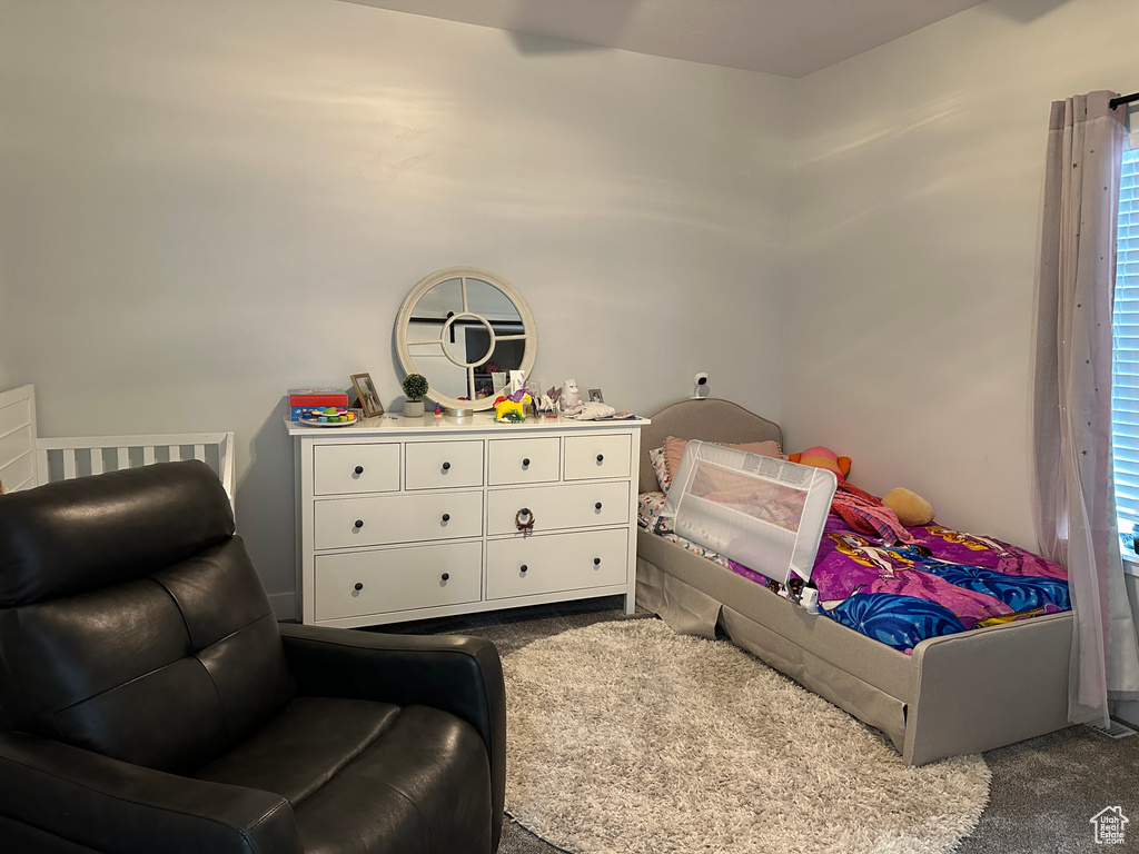 View of carpeted bedroom