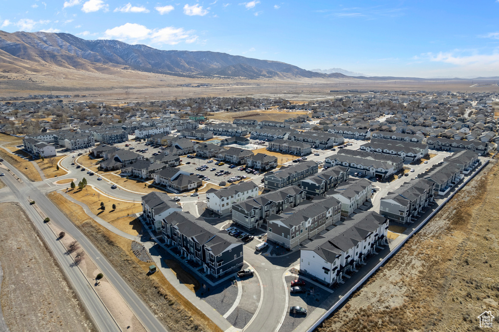 Drone / aerial view featuring a mountain view and a residential view