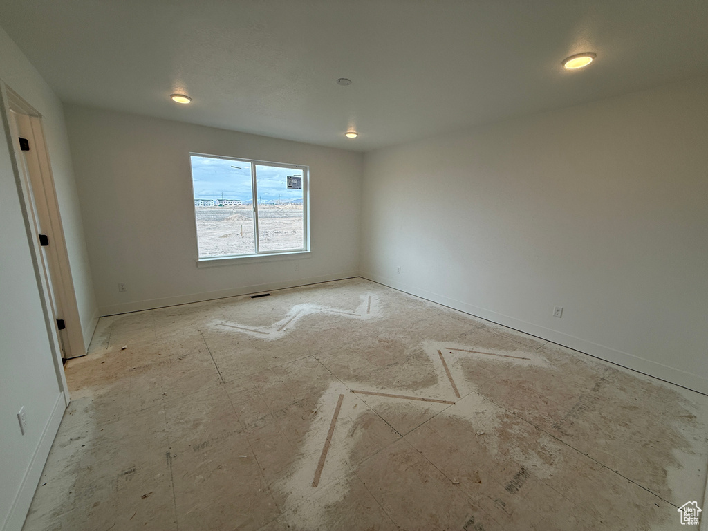 Empty room with baseboards