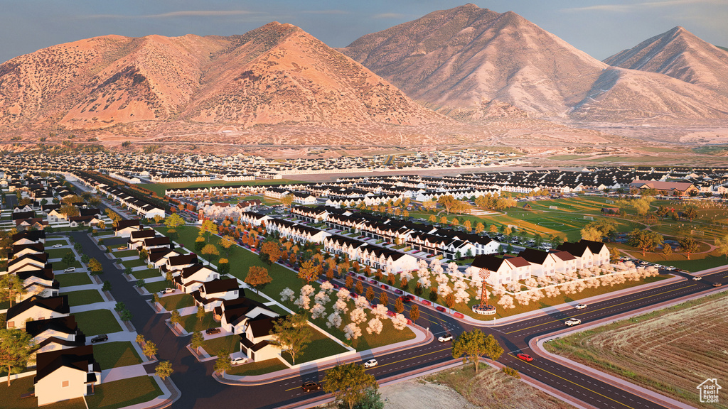 Birds eye view of property with a mountain view
