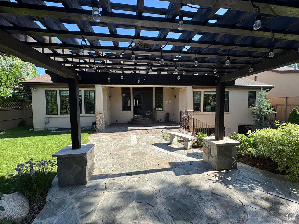 View of patio with a pergola
