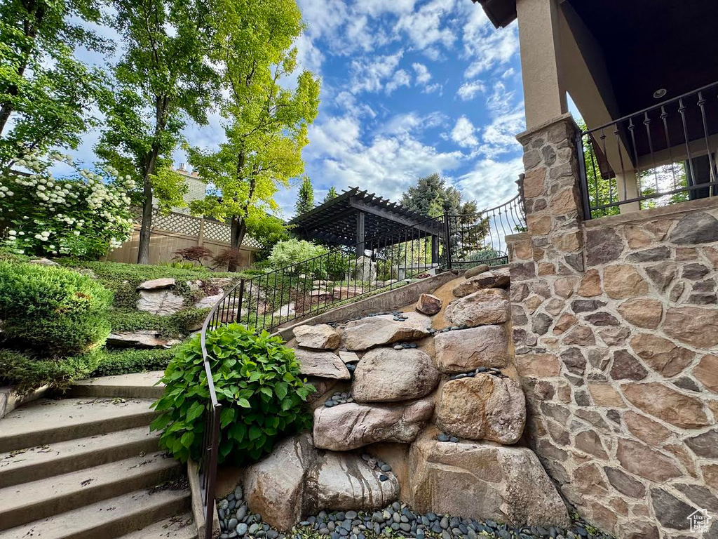 View of yard featuring fence