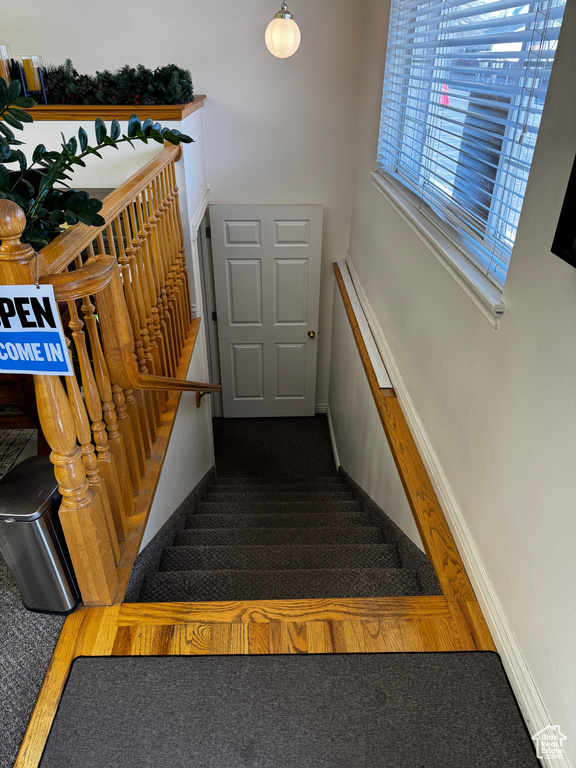 Stairs featuring baseboards