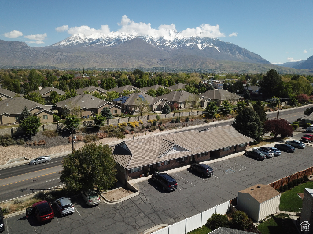Drone / aerial view featuring a residential view and a mountain view