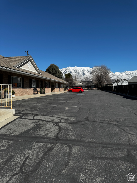 View of vehicle parking featuring a mountain view