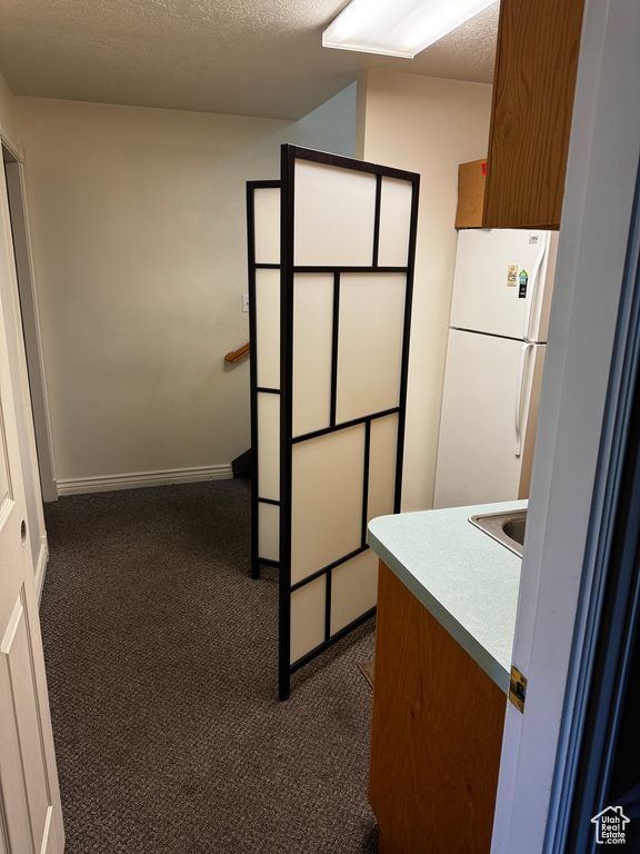 Interior space featuring carpet floors